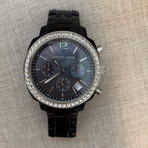 Black michael kors watch with opal face